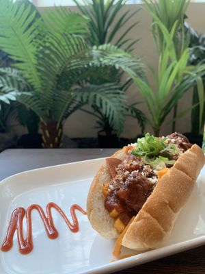 Mighty Meatball Sub. Gourmet meatless meatballs with rich and creamy basil tomato sauce with cheese and pepperoni slices at Zen Den in Mooloolaba