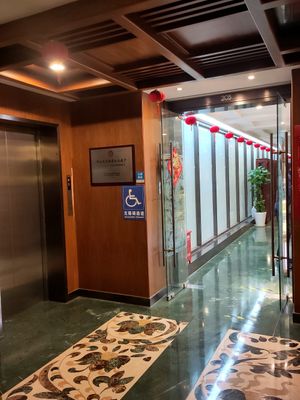 Elevator where you come out on the second floor and turn left into the restaurant. at GōngDé Lín - Godly - Huanghe Rd in Shanghai