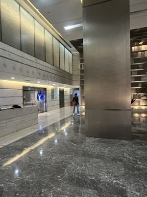 In the big hallway walk to the far right back site to find the elevator   at GōngDé Lín - Godly - Huanghe Rd in Shanghai