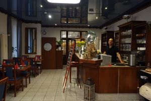 La Piazza restaurant from the inside, with Claudio, the happy vegan owner at La Cucina Verde in Friedrichsthal