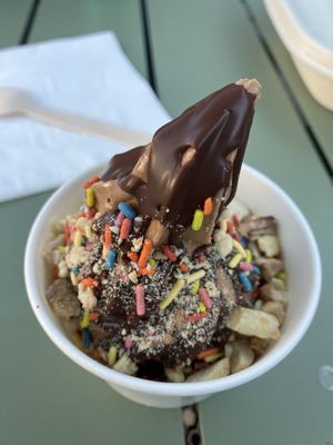 Chocolate oat milk ice cream with vegan hard shell and peanut crunch.   at Big Softie in Atlanta