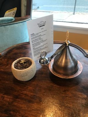 Food menu with sugar dispenser at The Baklava Lady in English Town