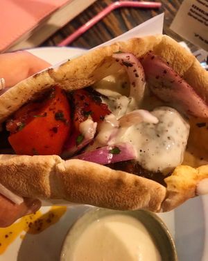 Kofte with yogurt sauce on it at The Baklava Lady in English Town