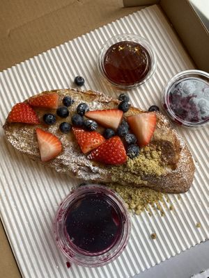 Excellent stuffed French Toast for takeout! It’s hard to tell how big the serving is but it is giant!   at Down 2 Earth in Langley