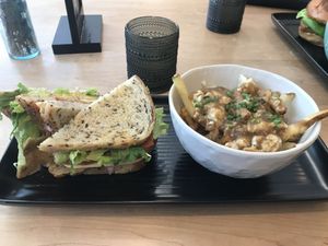 Club with poutine fries  at Down 2 Earth in Langley