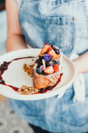French toast stuffed with rhubarb compote and vegan mascarpone topped with fresh berries and blueberry lemon maple syrup.  at Down 2 Earth in Langley
