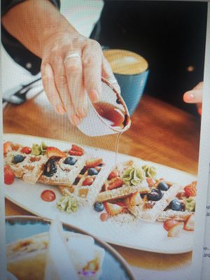 Sprouted Spelt Waffles with fresh berries and bourbon maple syrup  at Down 2 Earth in Langley