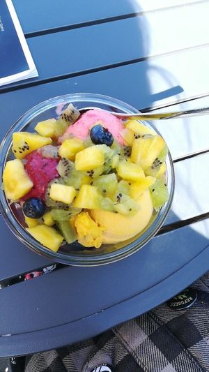Mango, blackberry and strawberry ice cream with pineapple, blueberry & kiwi fruit as topping  at Eismanufaktur Soest in Soest