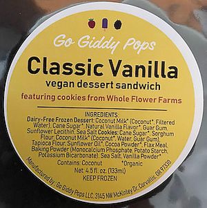 Classic Vanilla Frozen dessert sandwich made with creamy coconut milk  nestled between two fudgy dark chocolate brownies.  at Go Giddy Pops in Corvallis