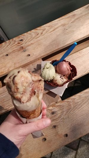 April 9th 2023: Mozartkugel + Licorice (left) and Mozartkugel + Red Nougat + Pumpkinseed (right) in freshly made ice cone/bowl. Delicious! at Thommy's Eismanufaktur in Leipzig