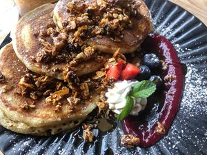 Pancakes with caramelised almonds, cream and berries at Greens & Co in Galway