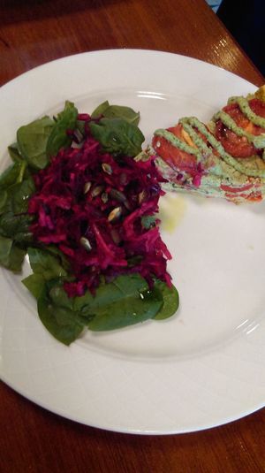 Ricotta tart with spinach, sun dried tomatoes and red peppers. at Greens & Co in Galway