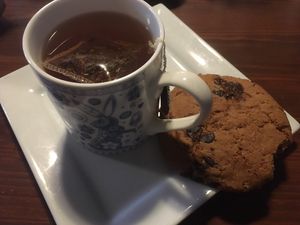 Yummy dark chocolate chip cookie with berry tea! 🍪 ☺️ at Greens & Co in Galway