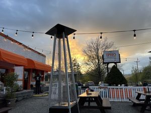 Outdoor seating near sunset   at IPho in New Paltz