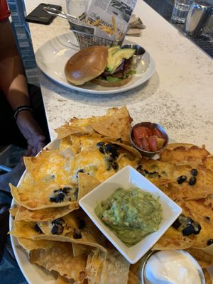 Nachos and beyond burger! at Numero Uno Beach House in San Juan