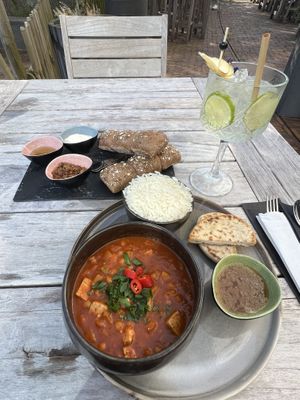 Vegan buttered chicken and bread/dips starter with a mocktail   at Gourmet Bar in Hoofddorp