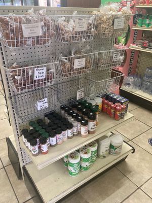 Protein powder, seasonings, nuts at Better Living Health Center & Deli in Nassau