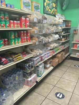 Inside the store: legumes, meat subs, teabags, plant milk, other ingredients such as wheat gluten, sauces, etc at Better Living Health Center & Deli in Nassau