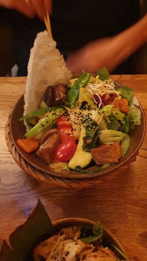 Kimchi and bowl with rice and veggies at Vegan House - Alaunstraße in Dresden