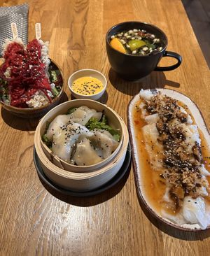 Green tofu sticks, dumplings and rice cake with mushrooms   at Vegan House - Alaunstraße in Dresden