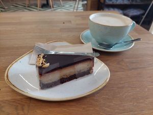 Chai latte and cake at Élelem Etterem in Budapest