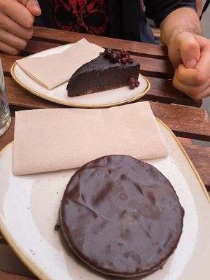 Wagon wheel style dessert (no marshmallow) & a chocolate orange cheesecake  at Élelem Etterem in Budapest