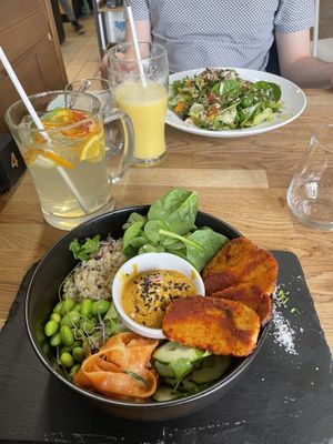 buddha bowl and vitamin salad (in the back)  at Élelem Etterem in Budapest