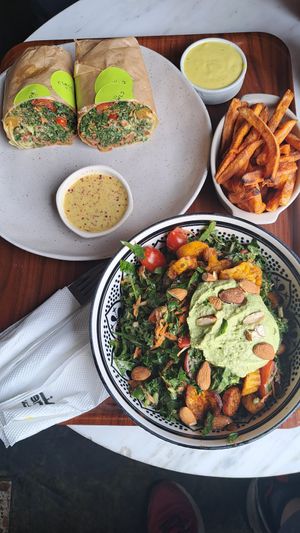 Big v-gan salad nad wrap with sweet potato fries at Manara Arts & Culture in Amman