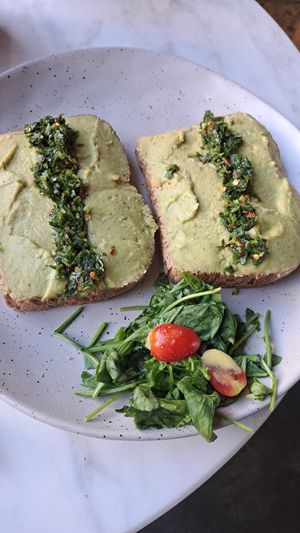 Hummus toast with salsa and chili flakes at Manara Arts & Culture in Amman