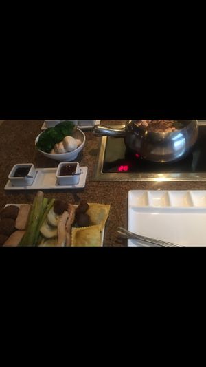 Vegan entree!! Got the Bourguignonne. Comes with gardein meats, veggies , and ravioli   at The Melting Pot in King Of Prussia