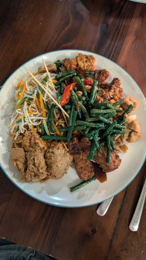 noodles as a base with jackfruit, different types of tempeh dishes, beans, tofu and salad at Warung Local in Canggu