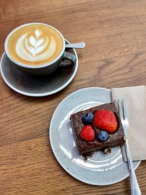 Oat Cappuccino and vegan cheese cake. at Rebelbean Vlněna in Brno