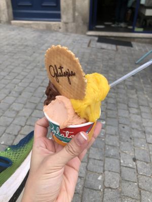 A medium.  Three scoops.  Guava, mango, chocolate. Delicious! at Gelatopia in Porto