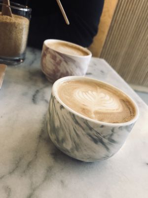 Liquid heaven, also known as coffee. (2 x oat milk cappuccino)   at Mica Coffeebar in Haarlem