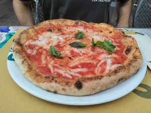 €15 margarita with a generous amount of basil haha at Pizzeria Donna Stella in Amalfi