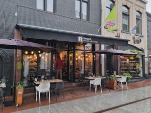 Front with outdoor seating at Smaeck in Weert