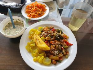 chop suy, aji, cold tea, salad at Maranatha in Quito