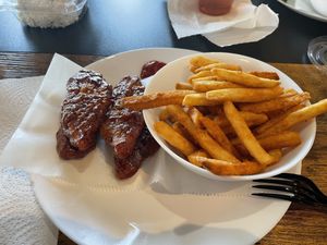Vegan tenders with BBQ sauce and fries  at Trend Urban Cafe in Stone Mountain