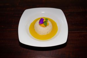 Sticky Mango Pudding
-
Sweet mango sauce and pandan infused sticky rice at VANA in Karo