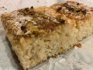 Basbousa (Semolina and Coconut Tray & Pistachio Nuts)  at Falafel Fella in Darlington