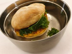 Flux burger in my own container! at Flux in Brighton