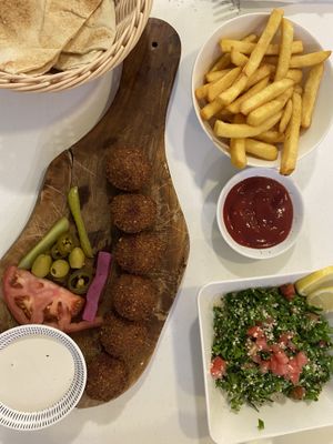 Falafel platter with side of taboleh and fries!   at Falafel en Hummus in The Hague
