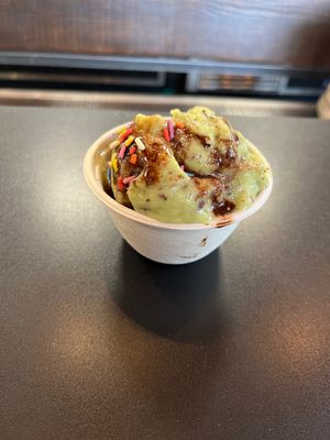 Mint chocolate chip with chocolate sauce and sprinkles   at Bliss Scoop Shop in University Place