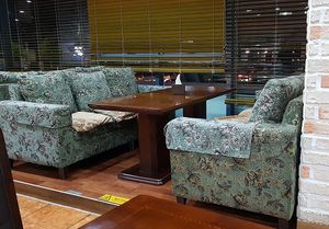 Interior of location, seating area - couches by the windows at Salrim Vegetarian Buffet 살림 채식뷔페 - Nam in Gwangju