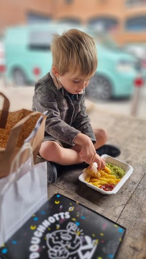 My kids enjoying the food at There's No Catch in Guisborough