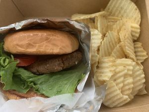 Burger and chips! Burger patty was scratch made from walnuts. at SO Veganly in Spring