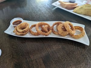 Onion rings with BBQ sauce (gluten free!) at SO Veganly in Spring