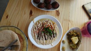 hummus with chickpeas, fava beans and tahini at Tahini's Hummus in Beer Sheva