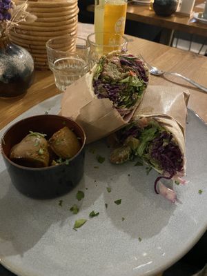 Falafel wrap with rosemary potatoess  at Oscar Natural Good Food & Bar in Koblenz