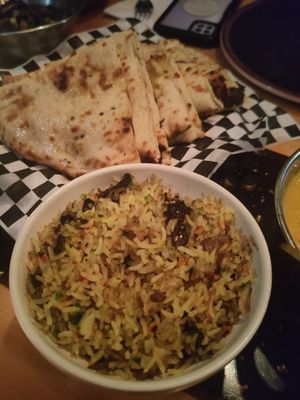 Mushroom rice and peshwari naan at Cinnamon Lounge and Dining in Keynsham